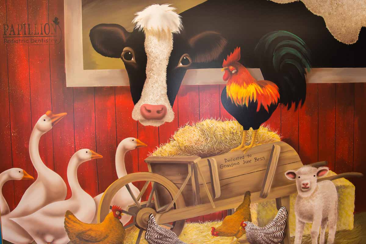 Farm-themed mural near the treatment bays